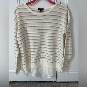 Sweater with mesh detail around the bottom